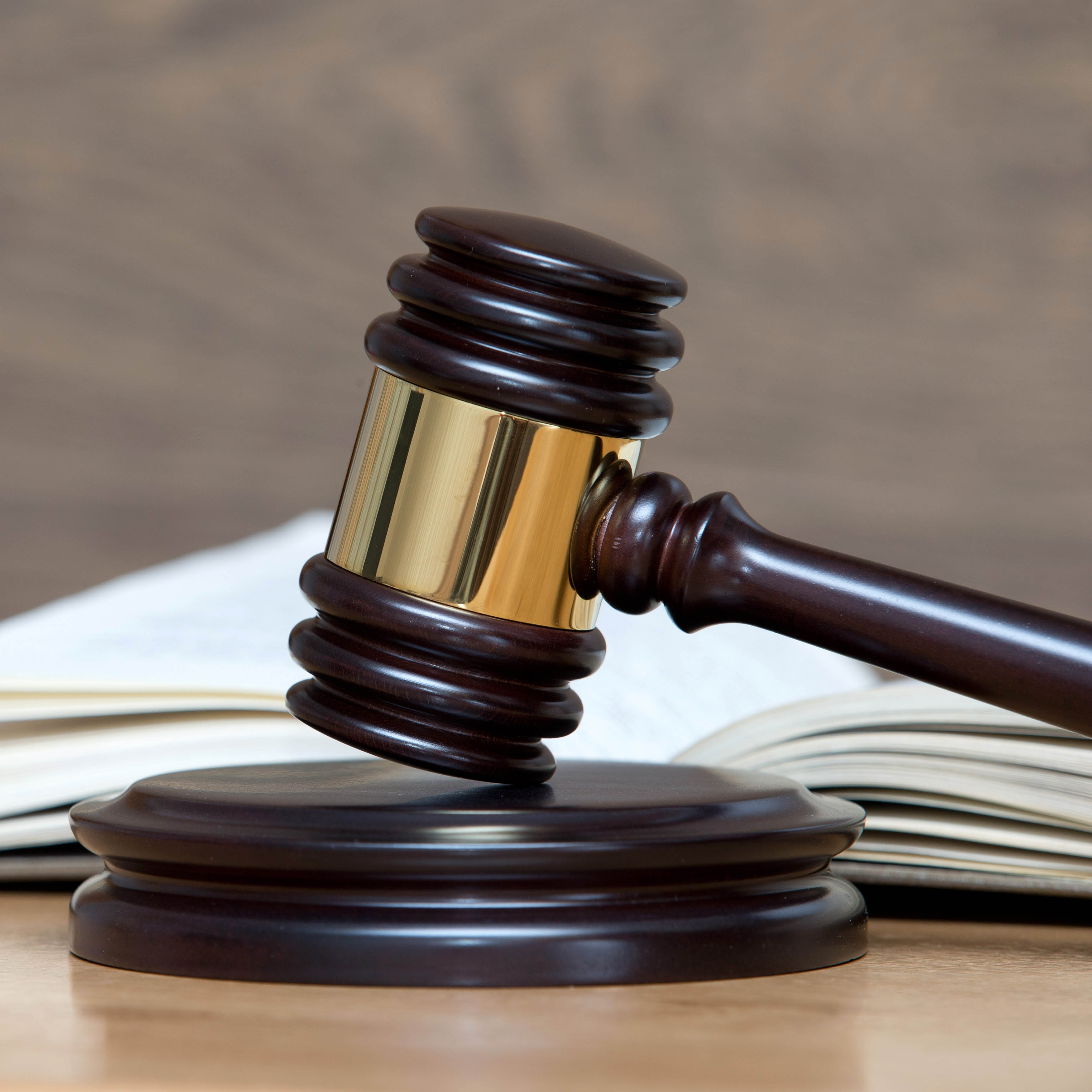 gavel on desk with a book